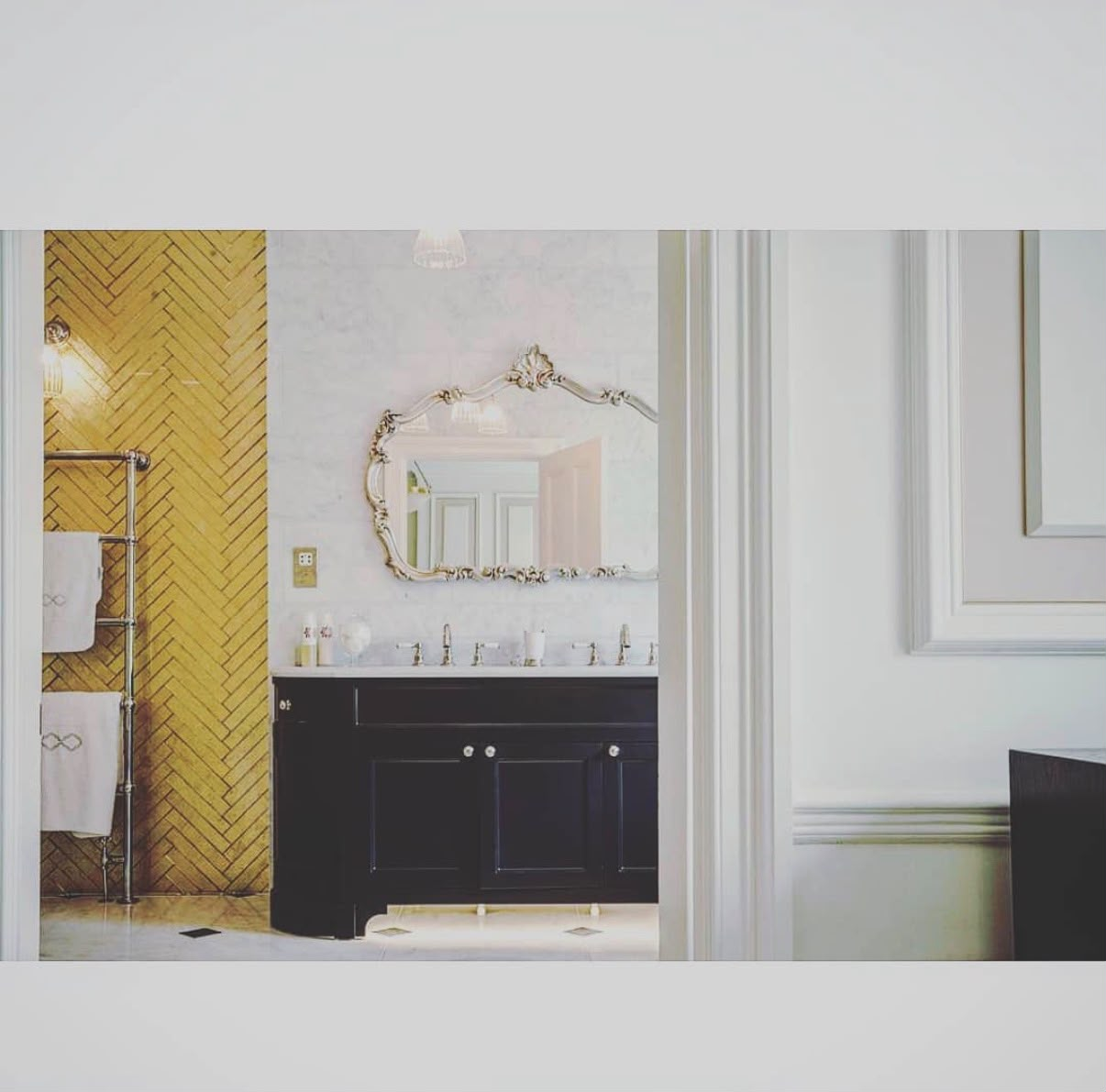 Bathroom with herringbone feature tiling